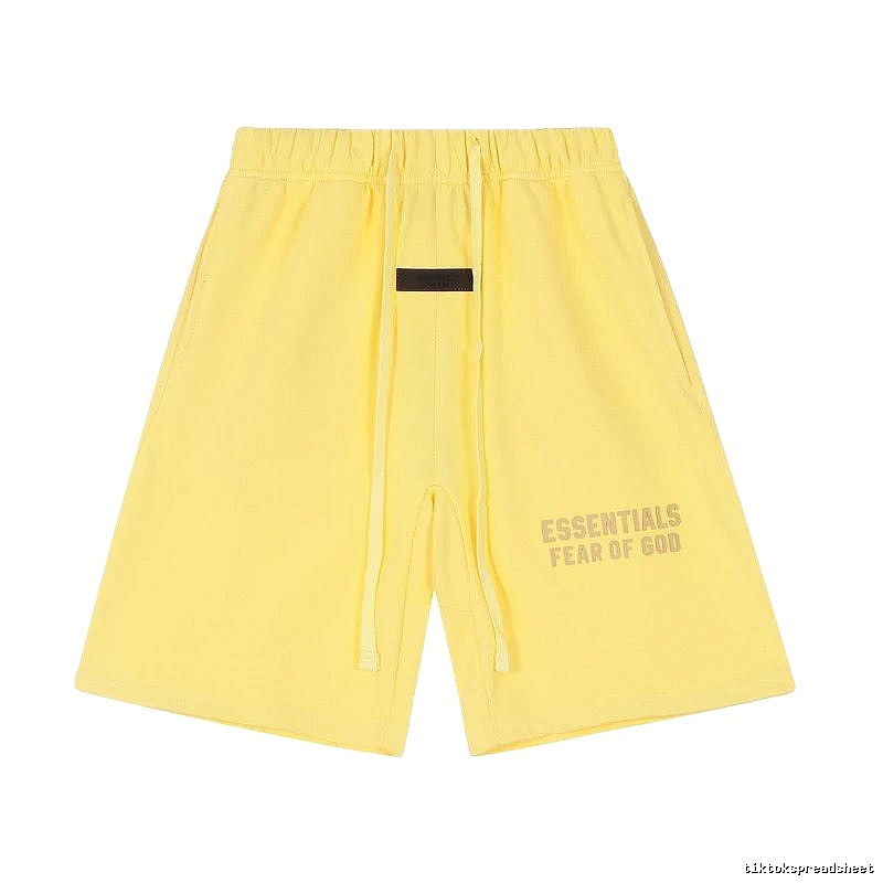 ESSENTIALS minimalist style yellow shorts