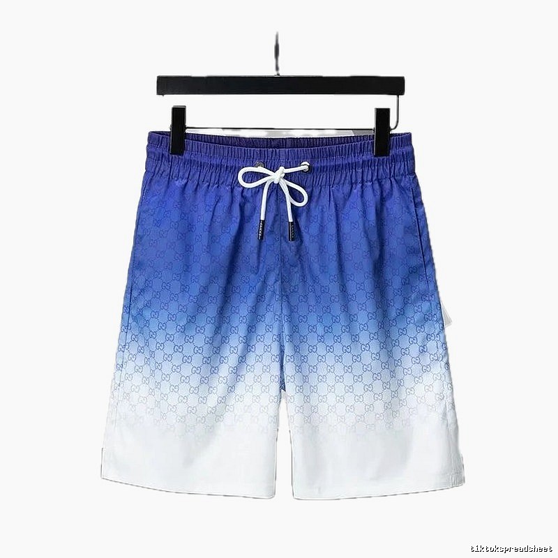 Gucci gradient-style blue and white shorts