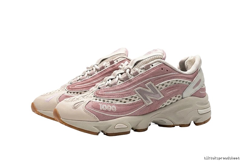 New Balance 1000 retro style pink and white shoes