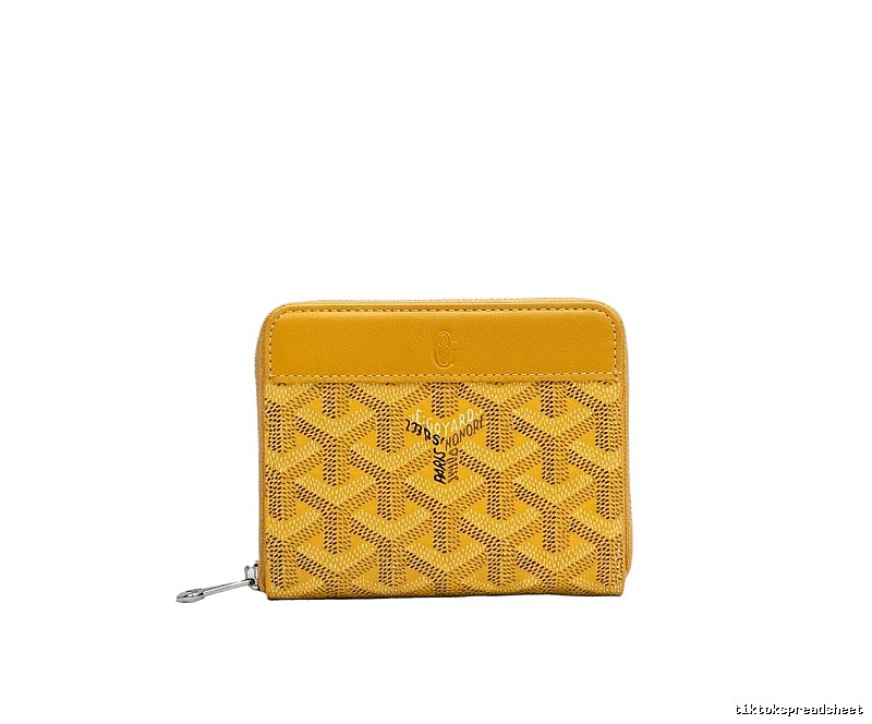 The classic yellow wallet of GOYARD